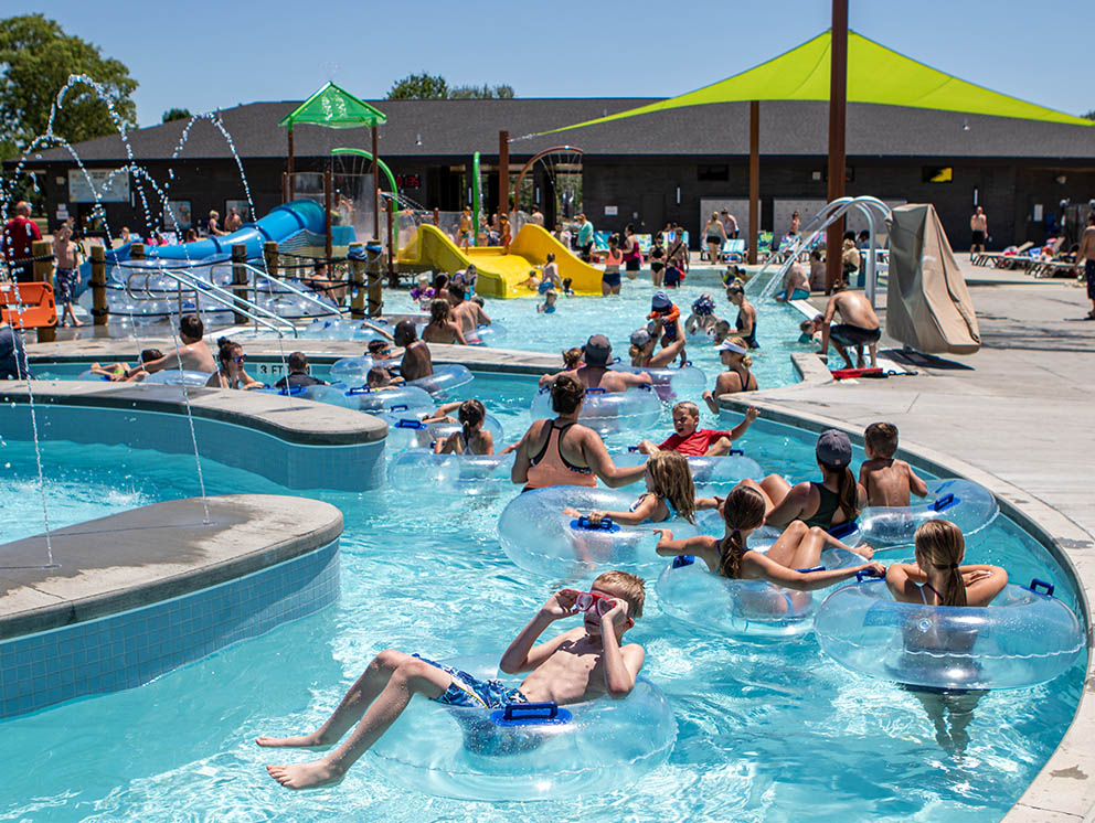 Swimmers tubing down the Lazy River.